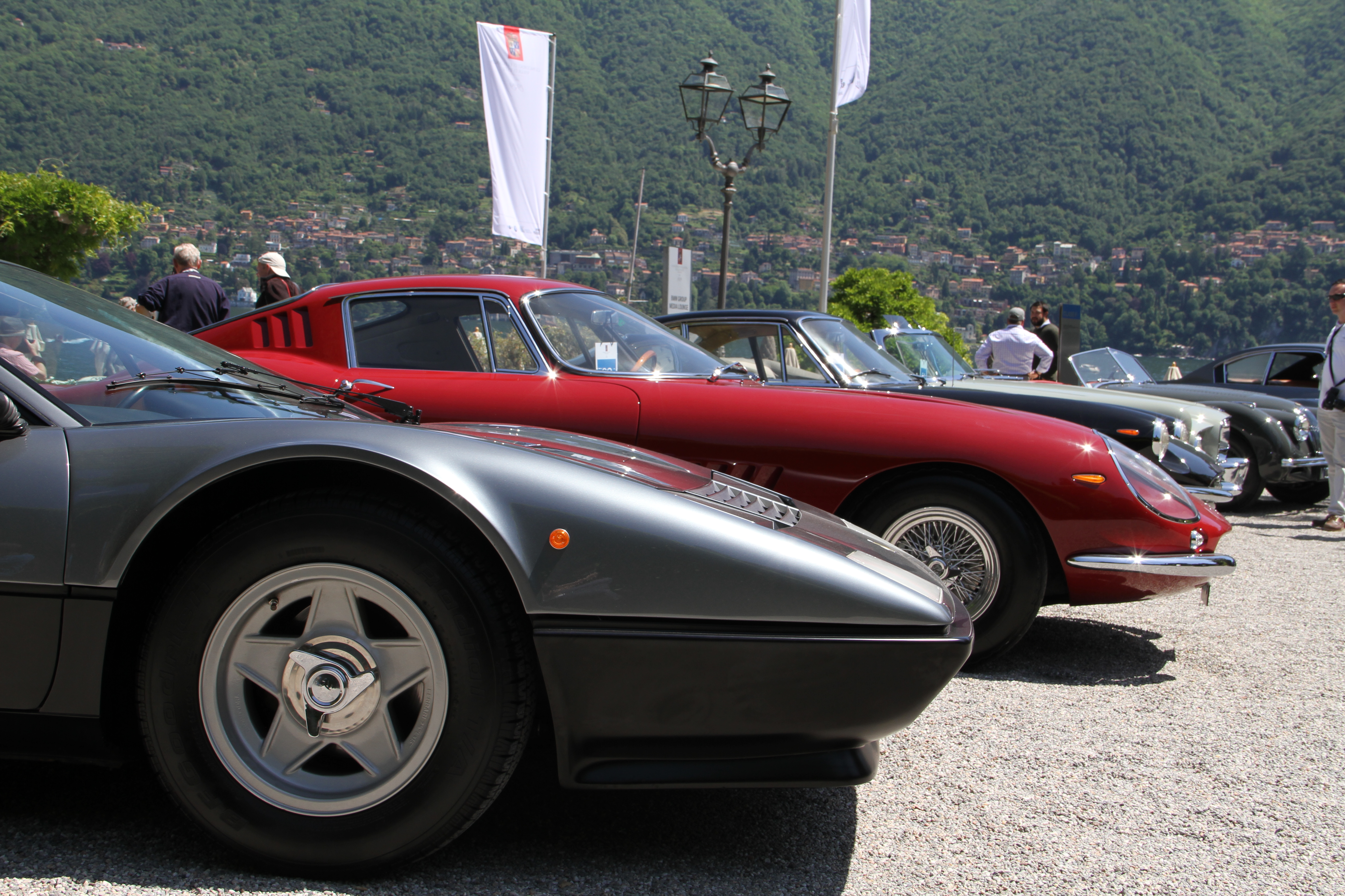 Ferrari 365 GBT/4 Berlinetta Boxer with Targa roof, formerly owned by Clint Eastwood, in front of a Ferrari 275 GTB/4 formely owned by Steve McQueen. 