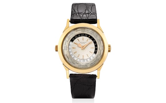 Lot 373 - Patek Philippe Two-Crown World Timer Ref. 2523/1 in Pink Gold. 