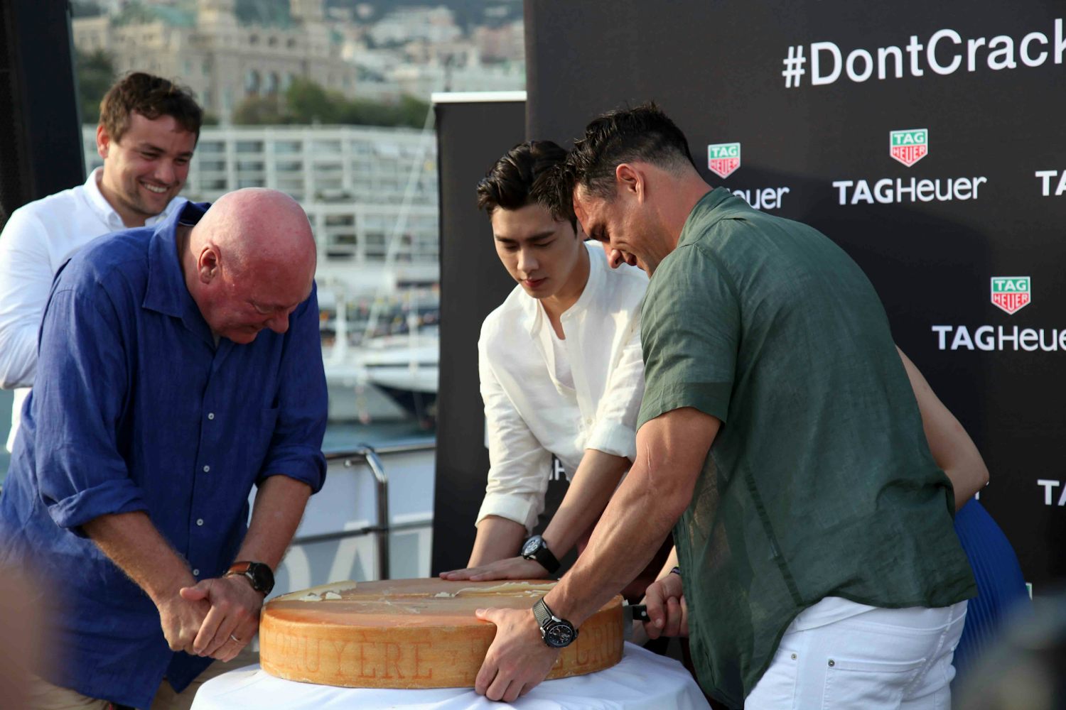 Jean-Claude Biver receives some help from New Zealand rugby legend Dan Carter, and Chinese actor Li Yi Feng.