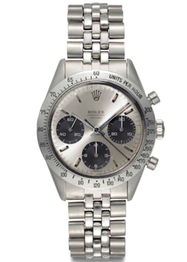 Lot 144: Rolex 6239 Floating Daytona with white dial displaying a soleil finish. 