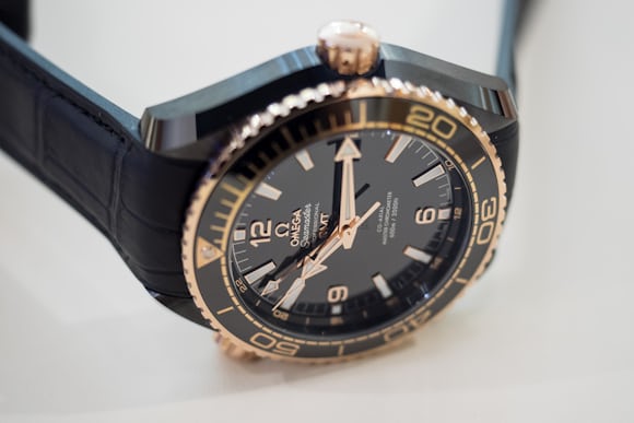 planet ocean deep black sedna gold dial and logo