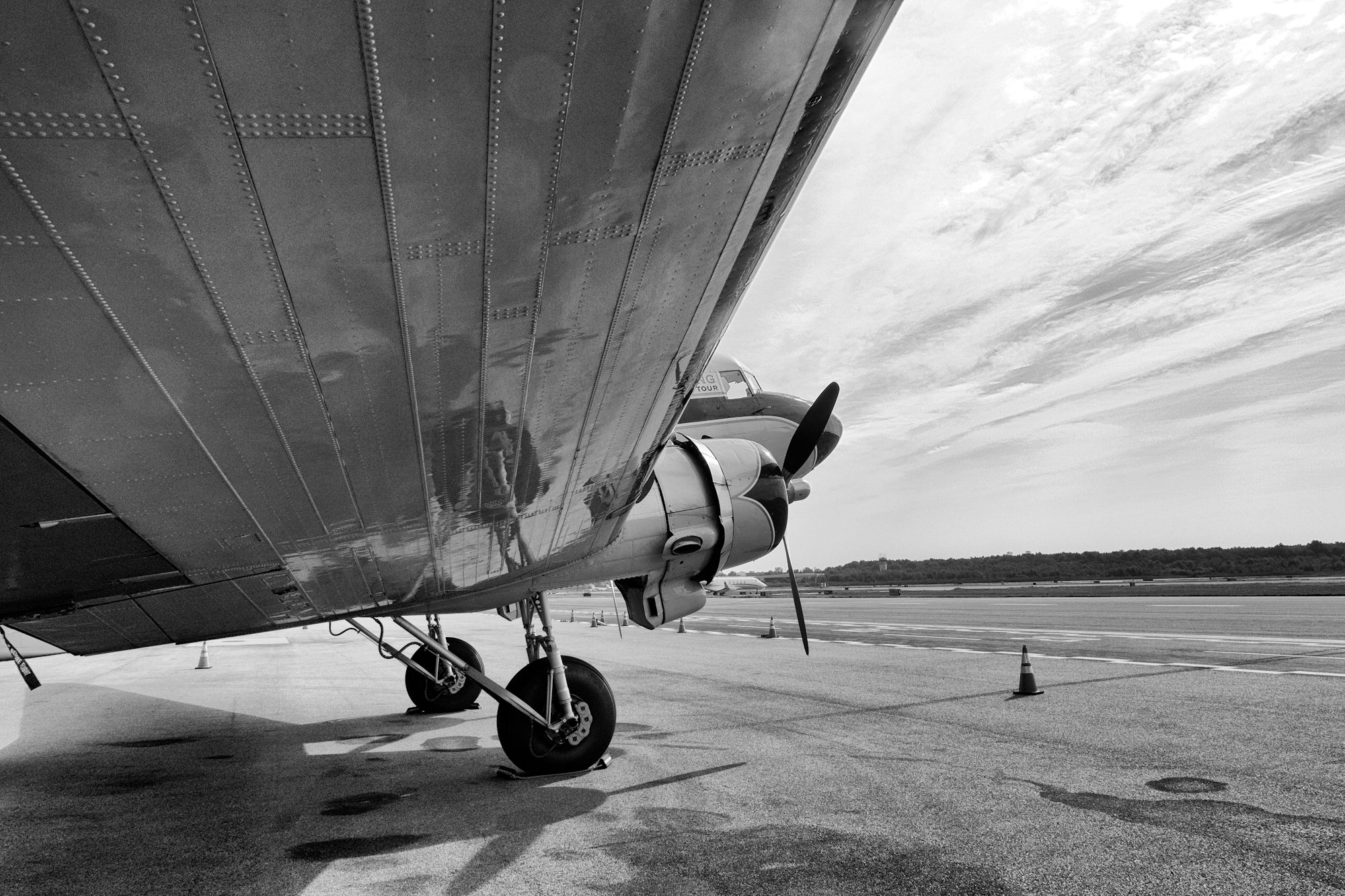 P8212240_bw P8212240_bw Breitling DC-3 wing and landing gear Dispatches: Breitling's DC-3 To Become Oldest Aircraft Ever To Circle The Earth Dispatches: Breitling’s DC-3 To Become Oldest Aircraft Ever To Circle The Earth P8212240 bw
