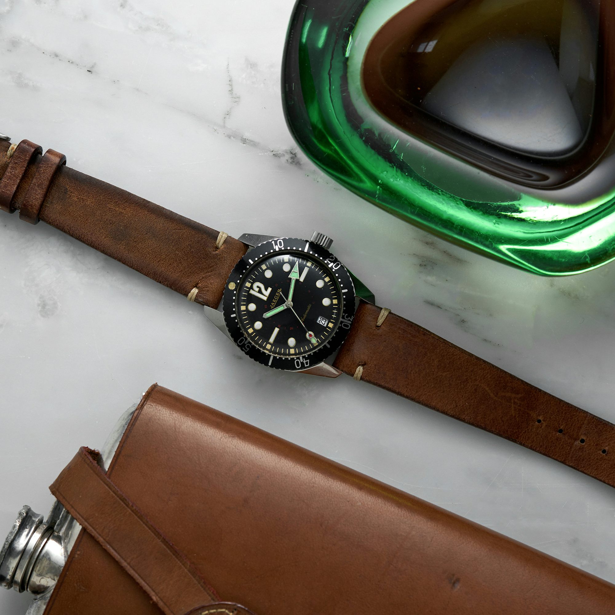 900-JaegerAutomaticDiver-Lifestyle 900-JaegerAutomaticDiver-Lifestyle In The Shop: A 1989 Tudor Submariner Reference 79090, 1938 Omega 'Flying Saucer' Reference CK2013, And A 1960s Jaeger Diver '20 ATM' In The Shop: A 1989 Tudor Submariner Reference 79090, 1938 Omega ‘Flying Saucer’ Reference CK2013, And A 1960s Jaeger Diver ’20 ATM’ 900 JaegerAutomaticDiver Lifestyle