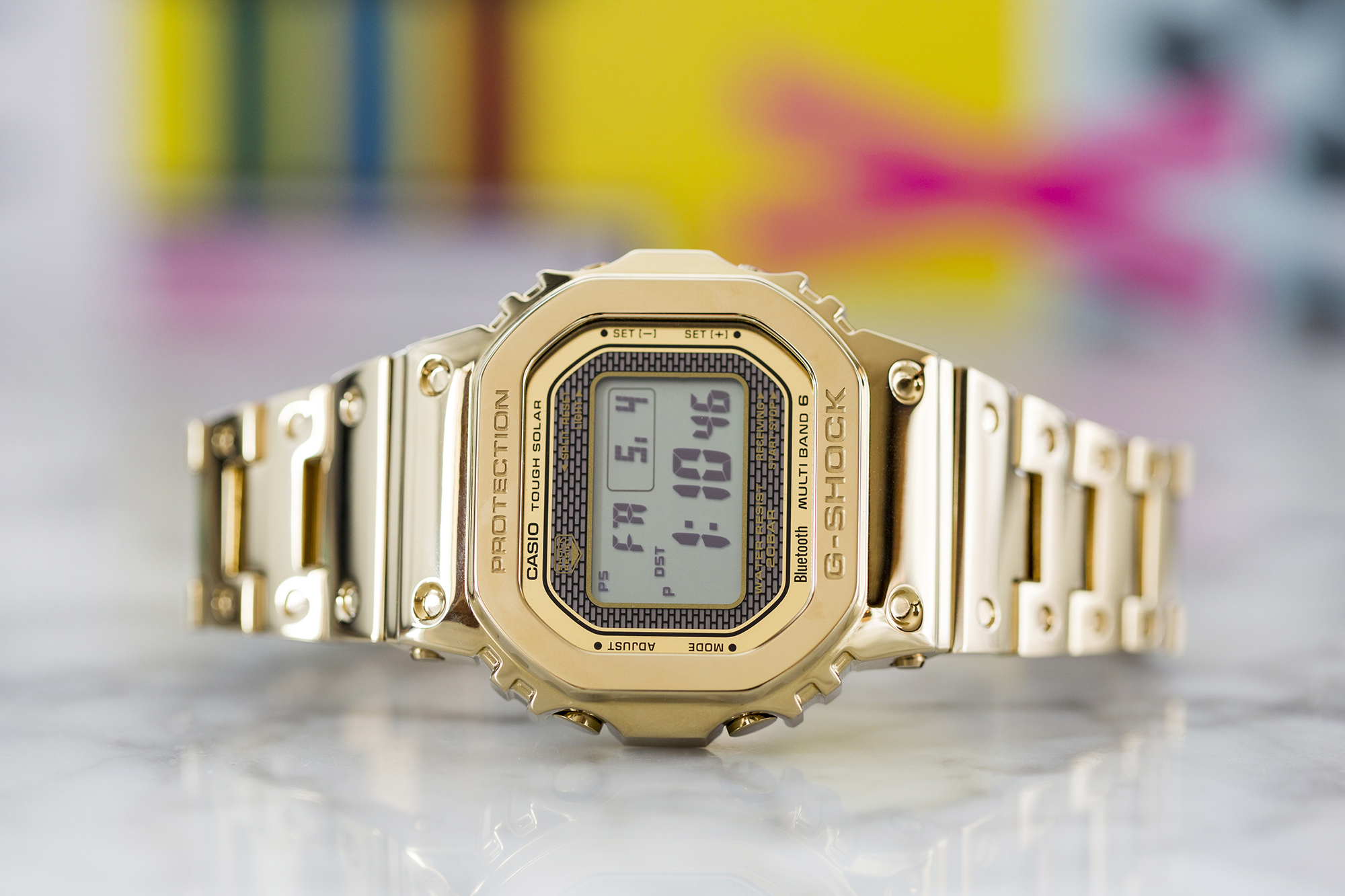 g shock black and gold bluetooth