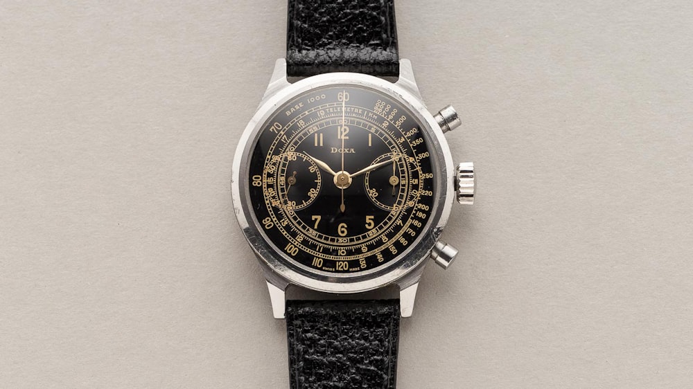 Bring a Loupe A Spillmann-Cased Doxa Chronograph, A Rolex Datejust Ref. 1601, And An Omega ...