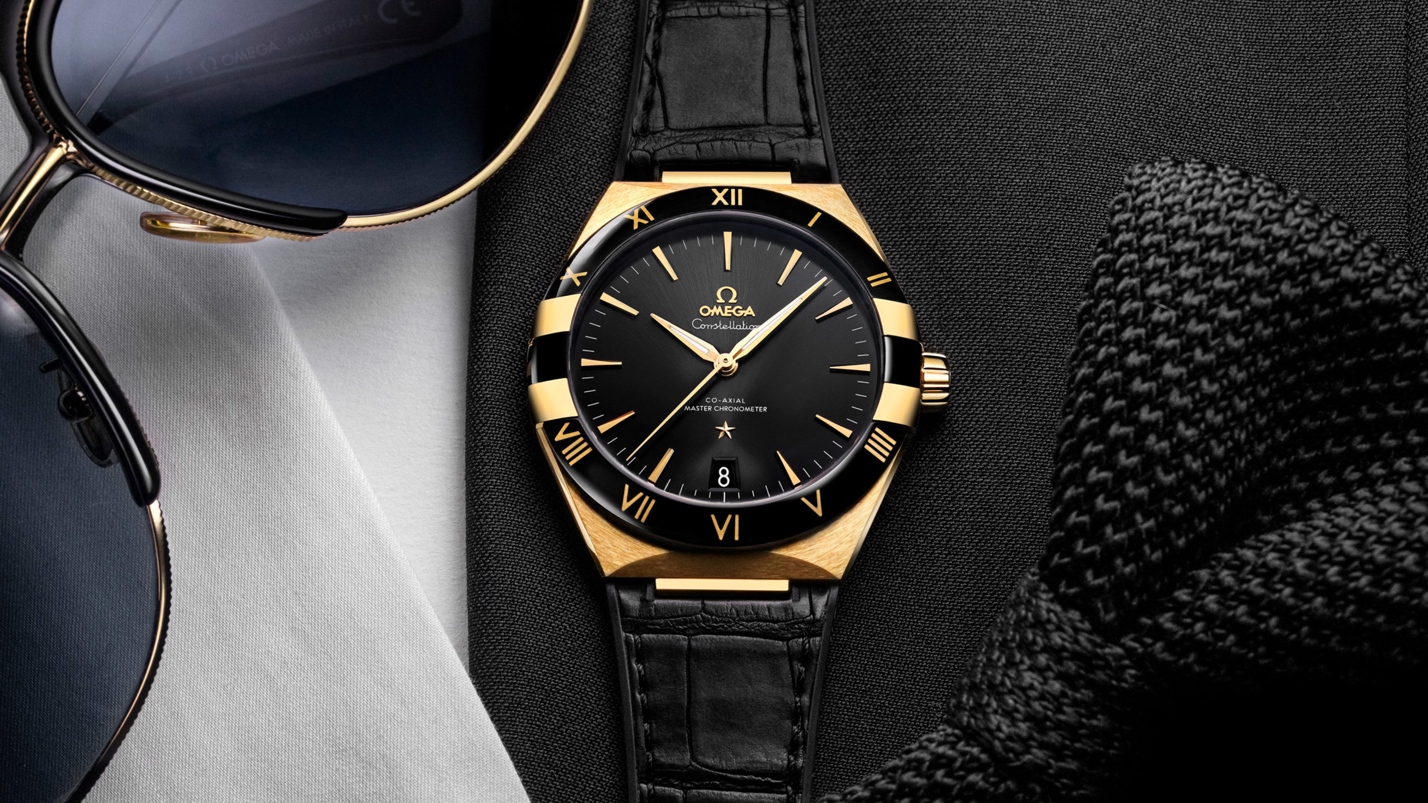 black and gold omega watch