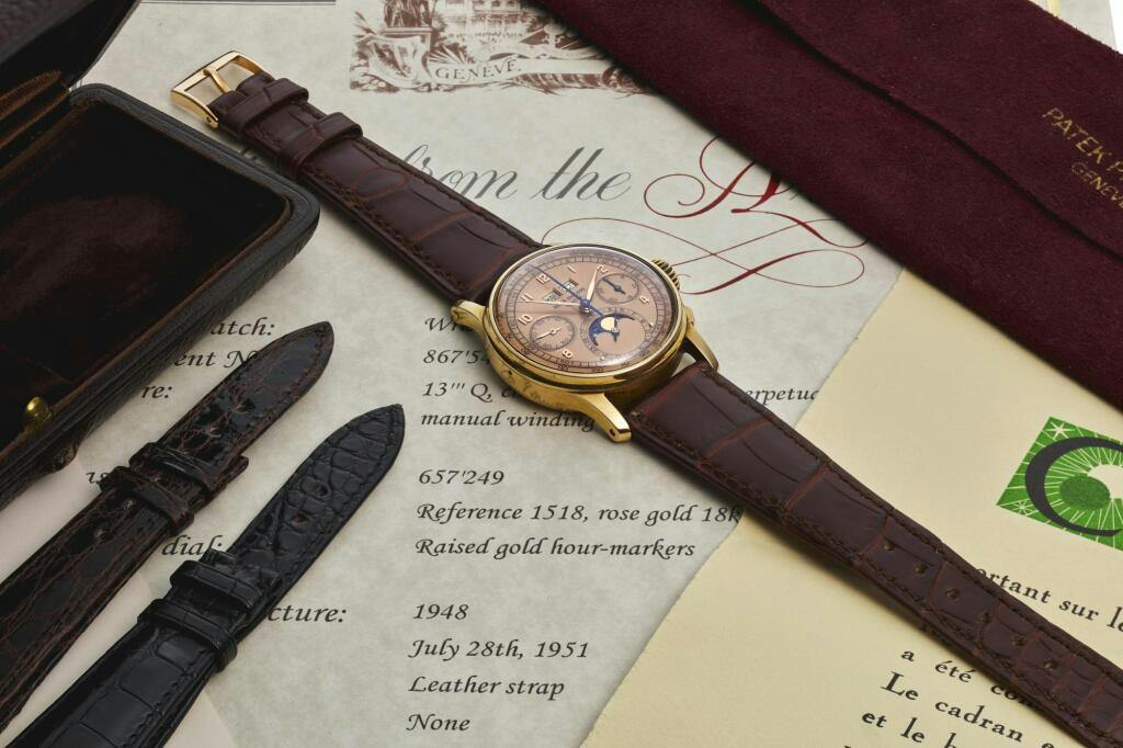 A three-quarter image of the Patek Philippe 1518 Pink on Pink that sold at Sotheby's