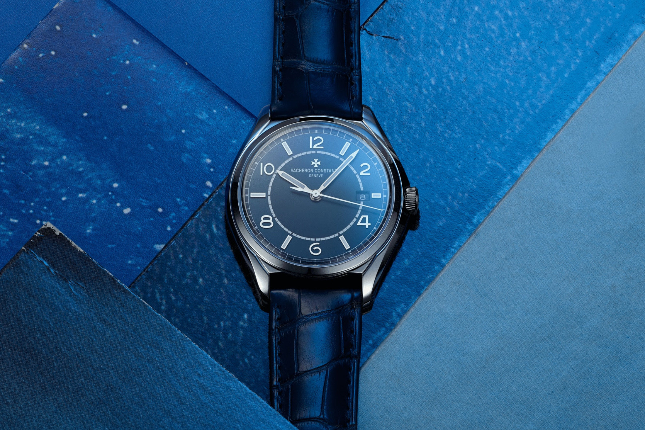 The Vacheron Constantin Fiftysix on a blue background. 