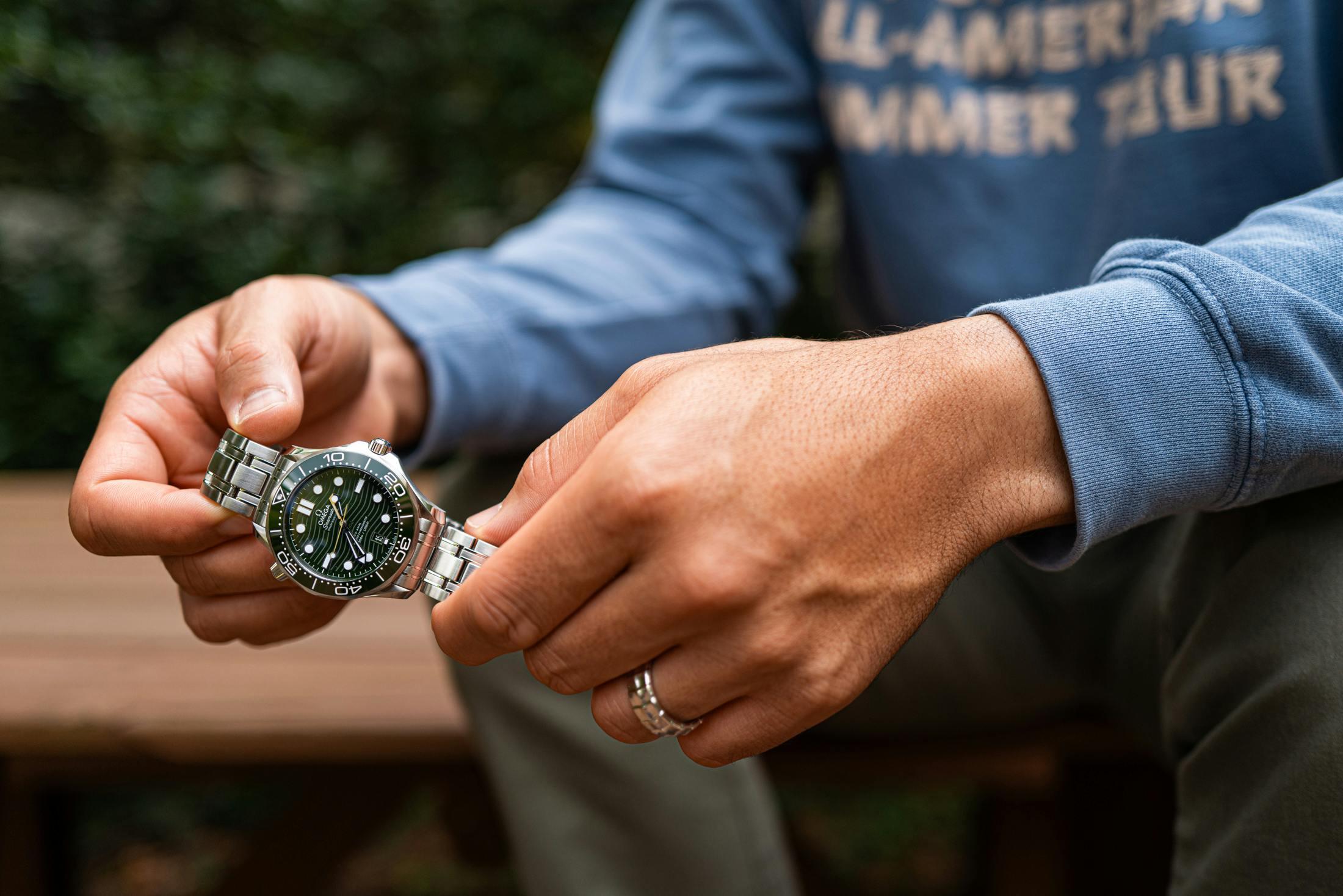 man holding watch