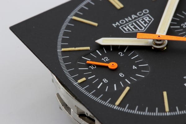 A close up on the dial of a Heuer Monaco