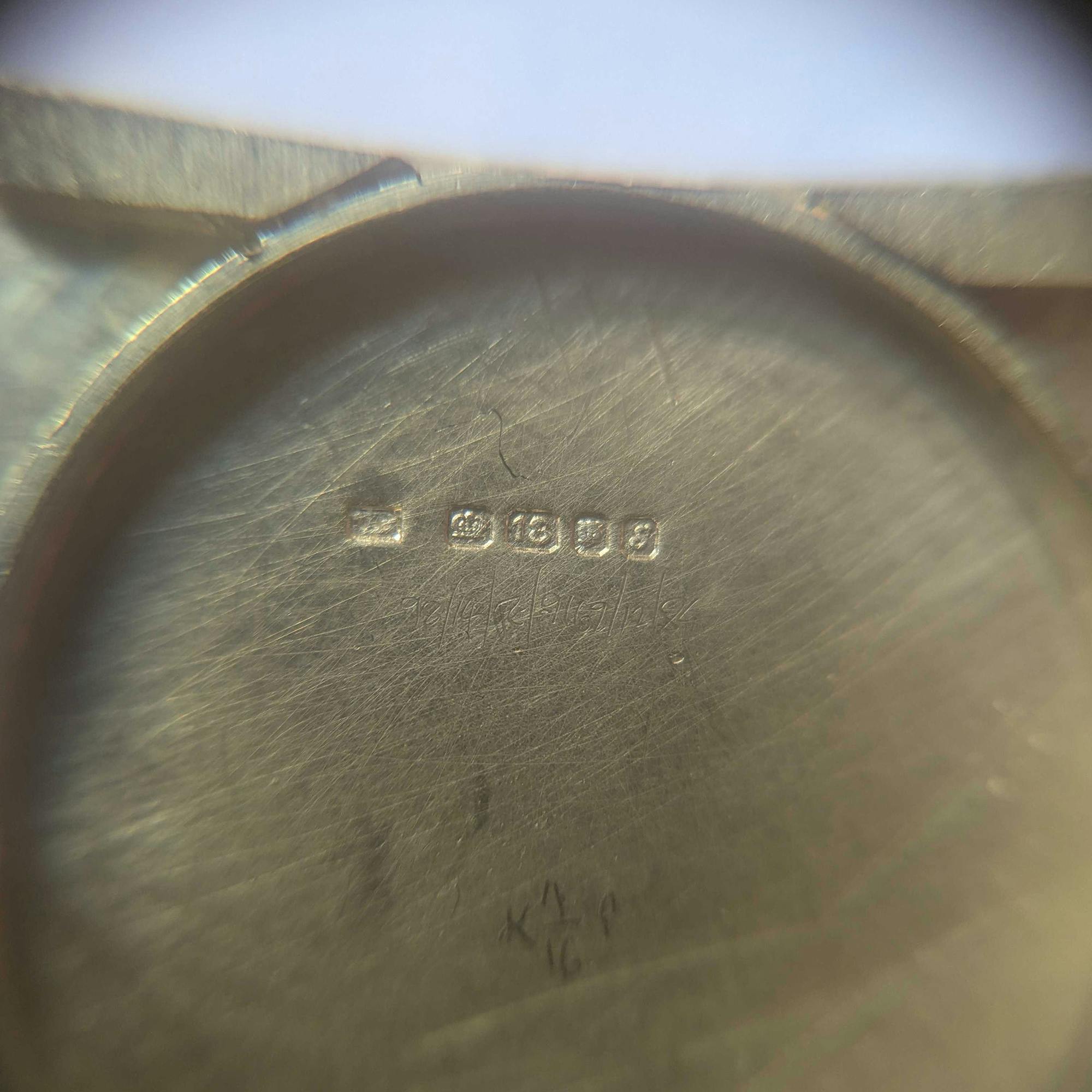 Hallmarks on a Cartier London Tank LC
