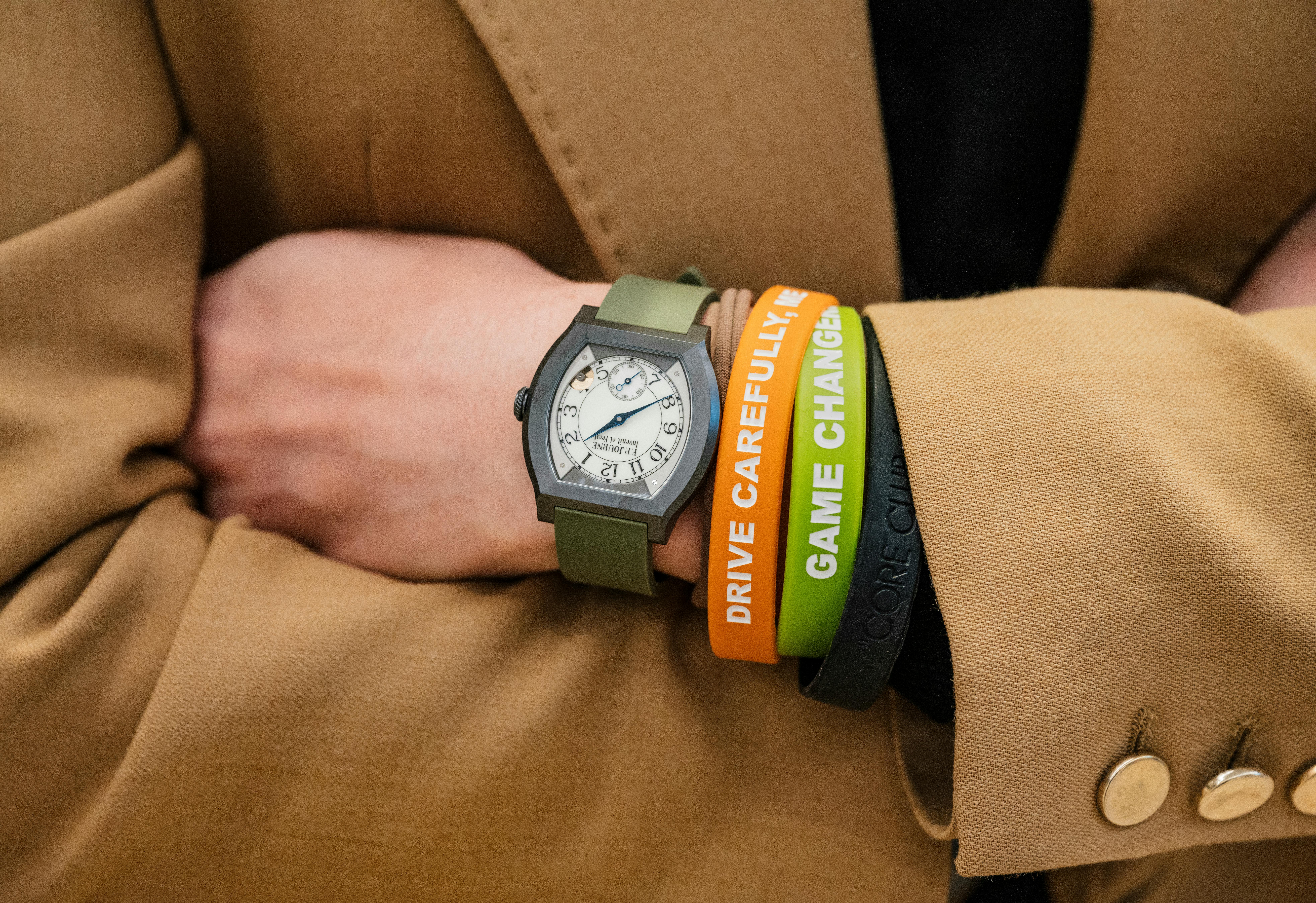 A woman wears an FP Journe Elegante with her arms crossed