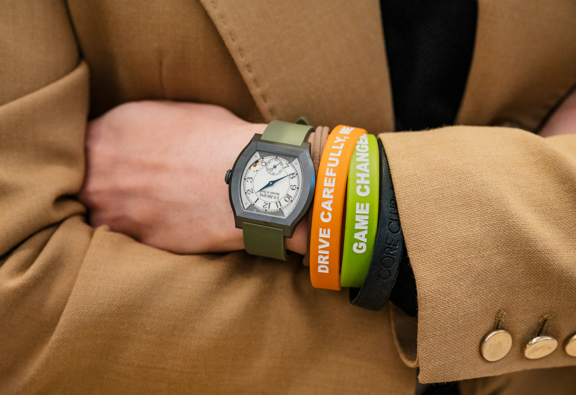 A woman wears an FP Journe Elegante with her arms crossed