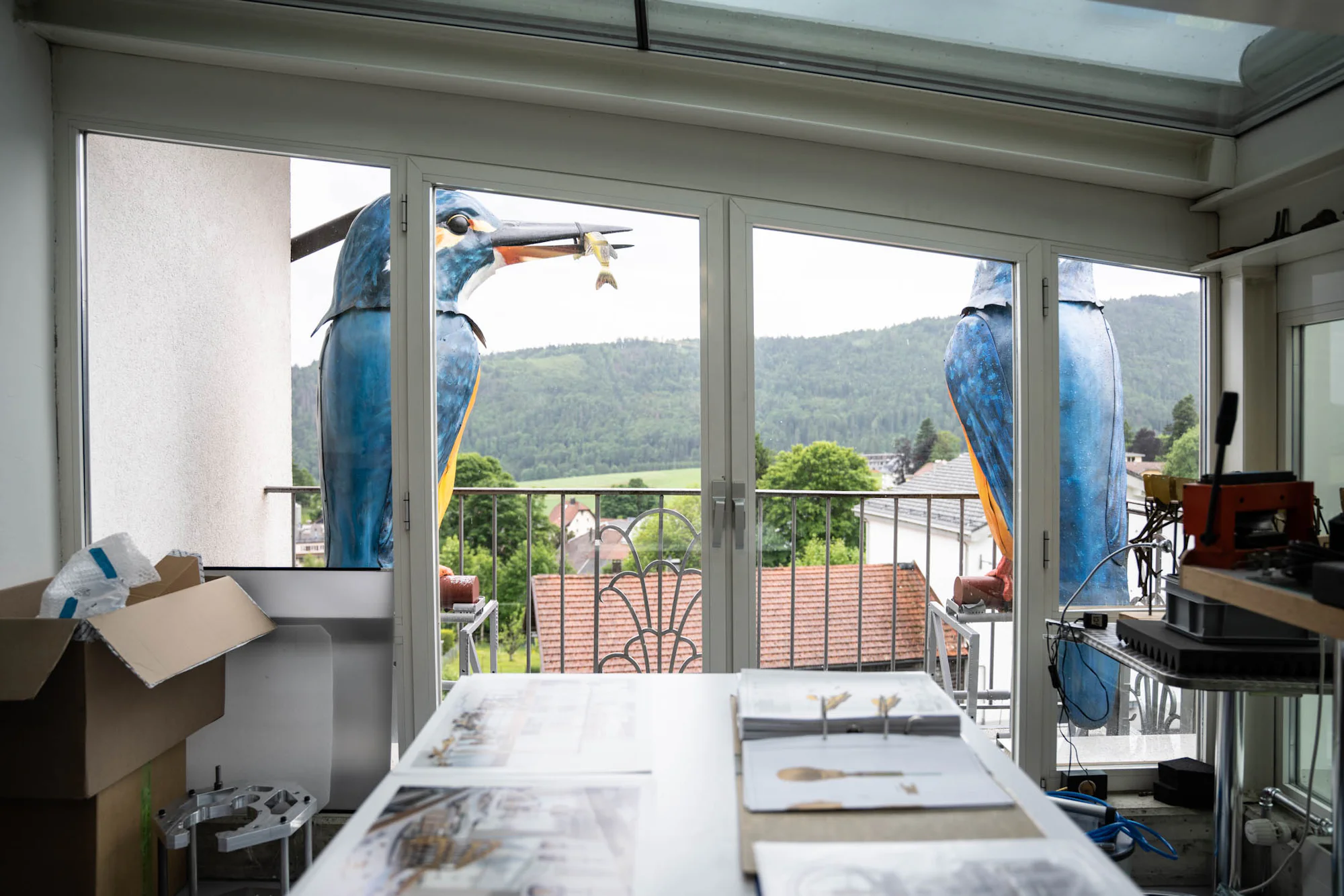Bird sculptures on balcony