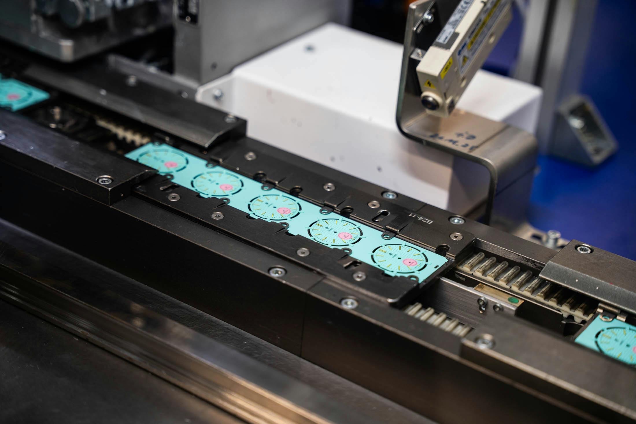 Royal Pop Dials on conveyor