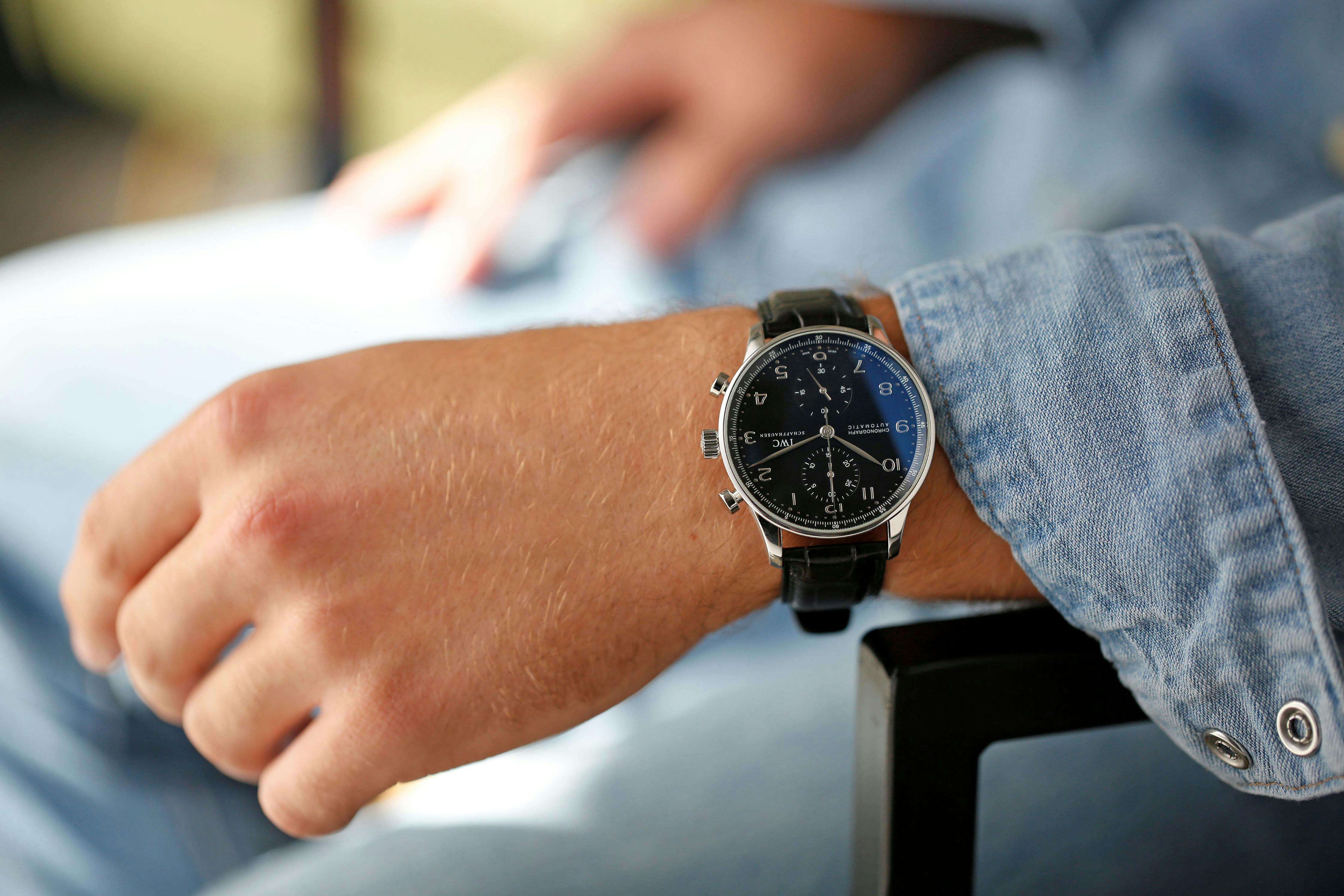 A shot of the IWC Schaffhausen Portuguese Chronograph on a man's wrist