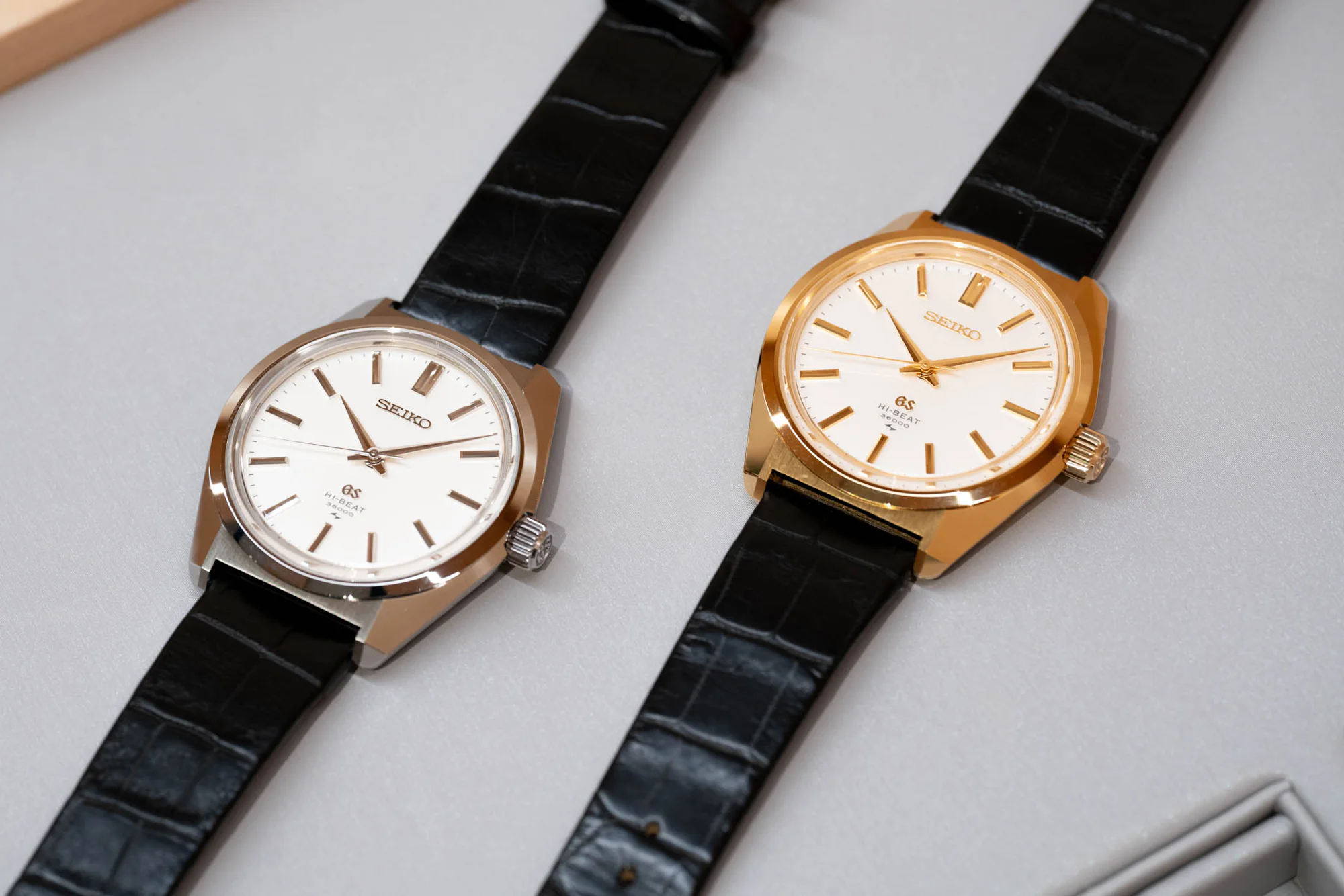 steel and gold watches together