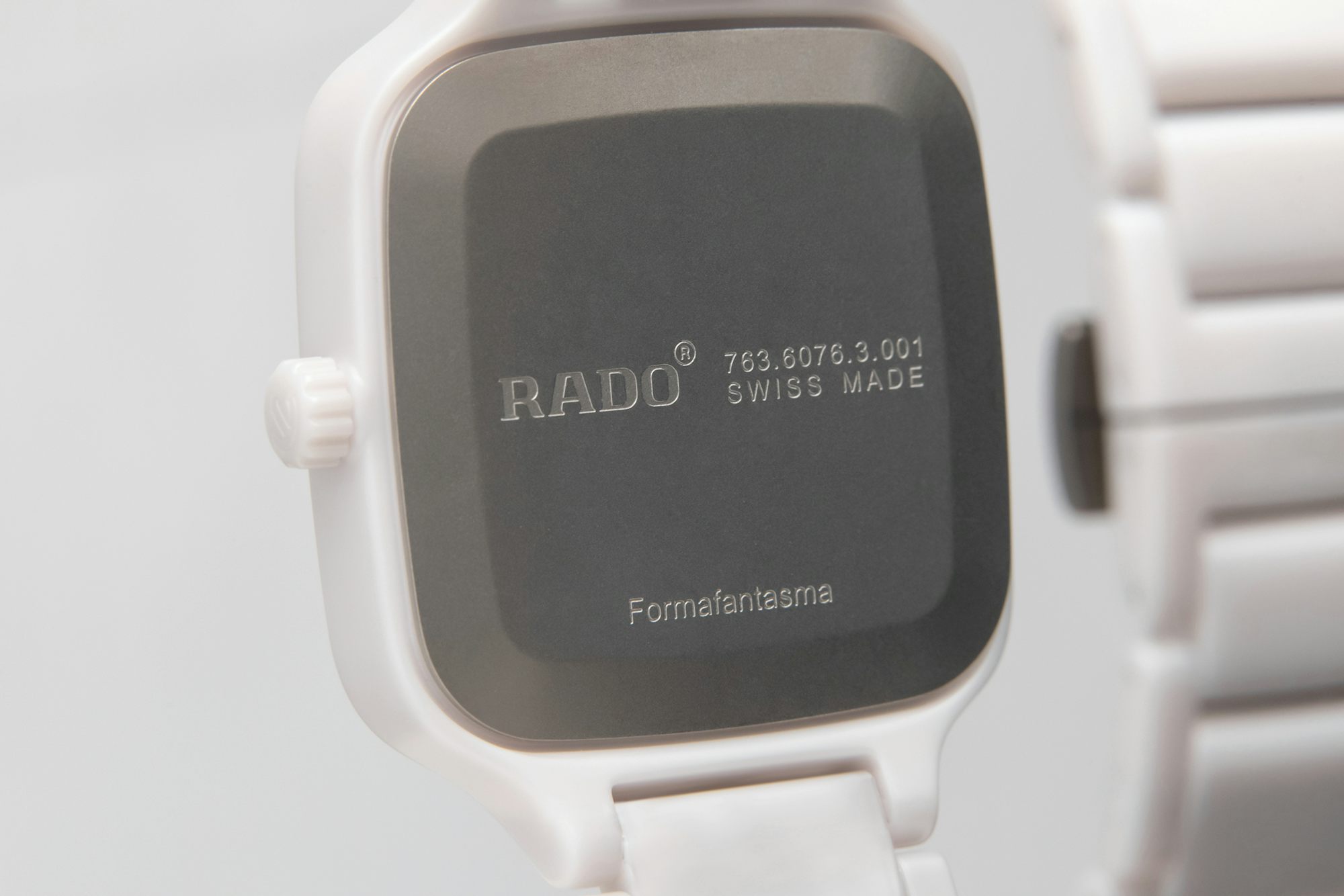 The caseback of a white Rado watch