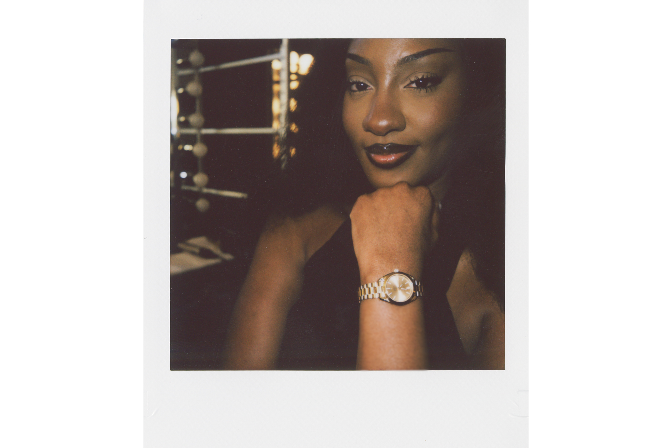 Tems wearing a watch