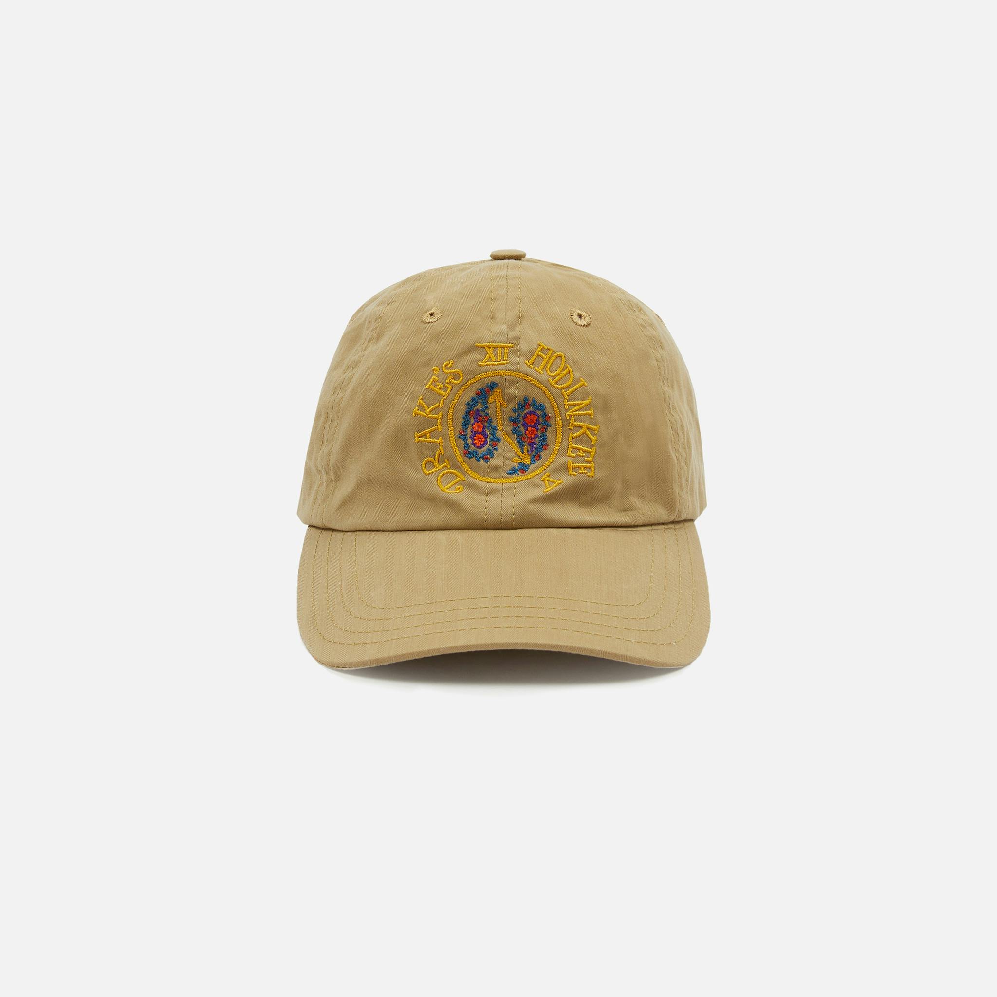 <p><a href="http://shop.hodinkee.com/products/drakes-baseball-cap" target="">Baseball Cap in Tan Cotton Herringbone</a></p>