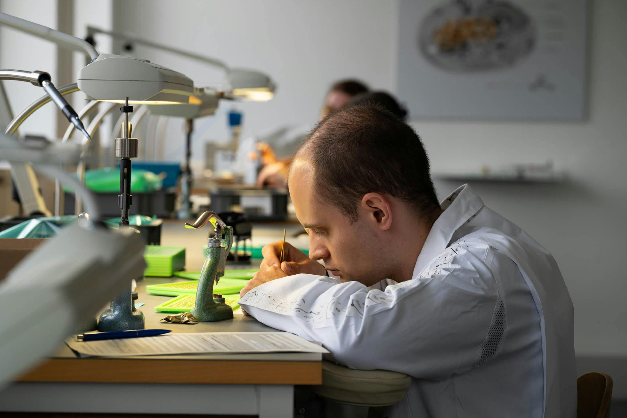 watchmaker working on balance
