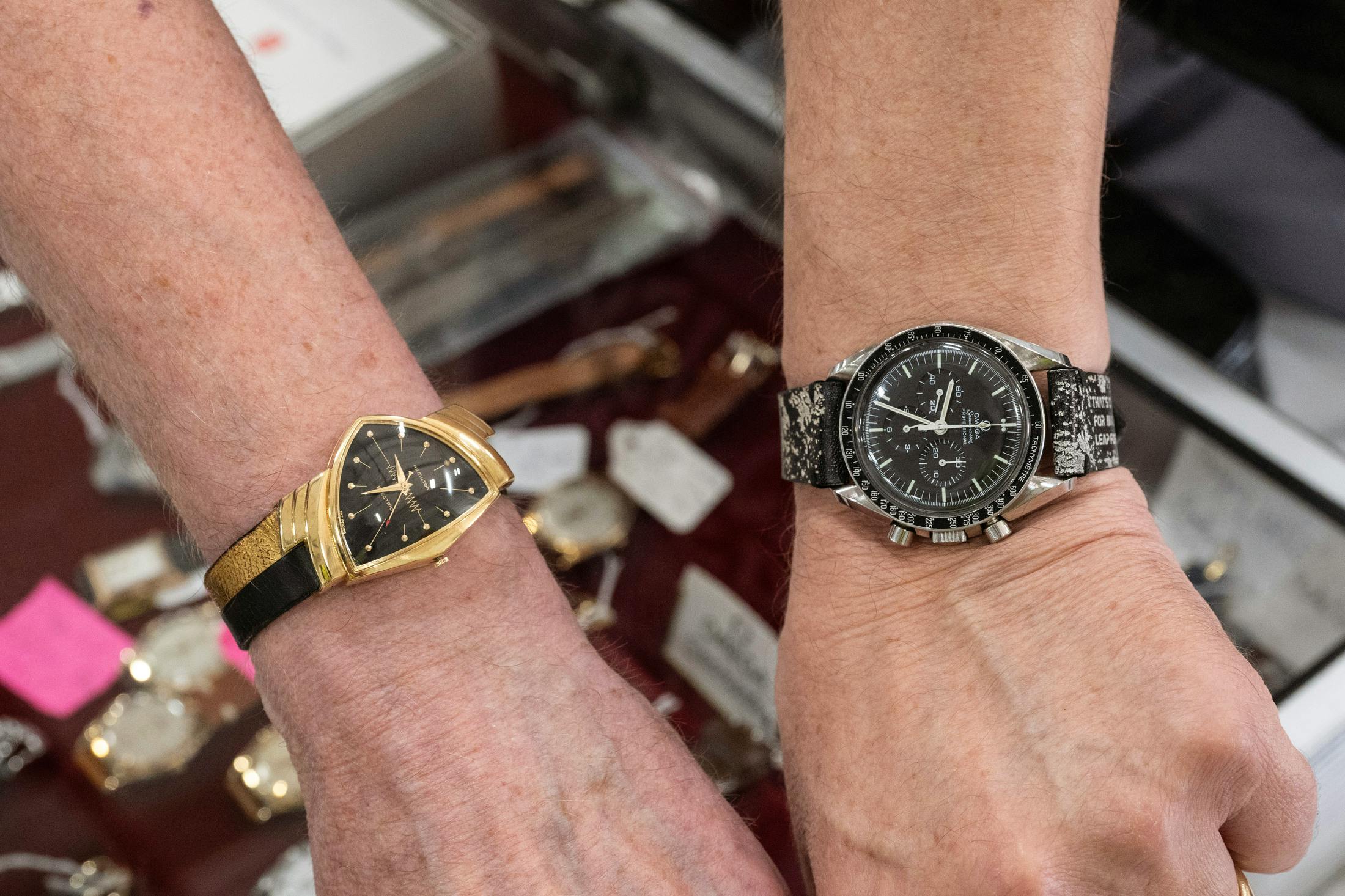 NAWCC board chair Jarrett Harkness with his Gold Hamilton Ventura (Elvis Presley) with Keith Yarbrough and his 321 Omega Speedmaster.