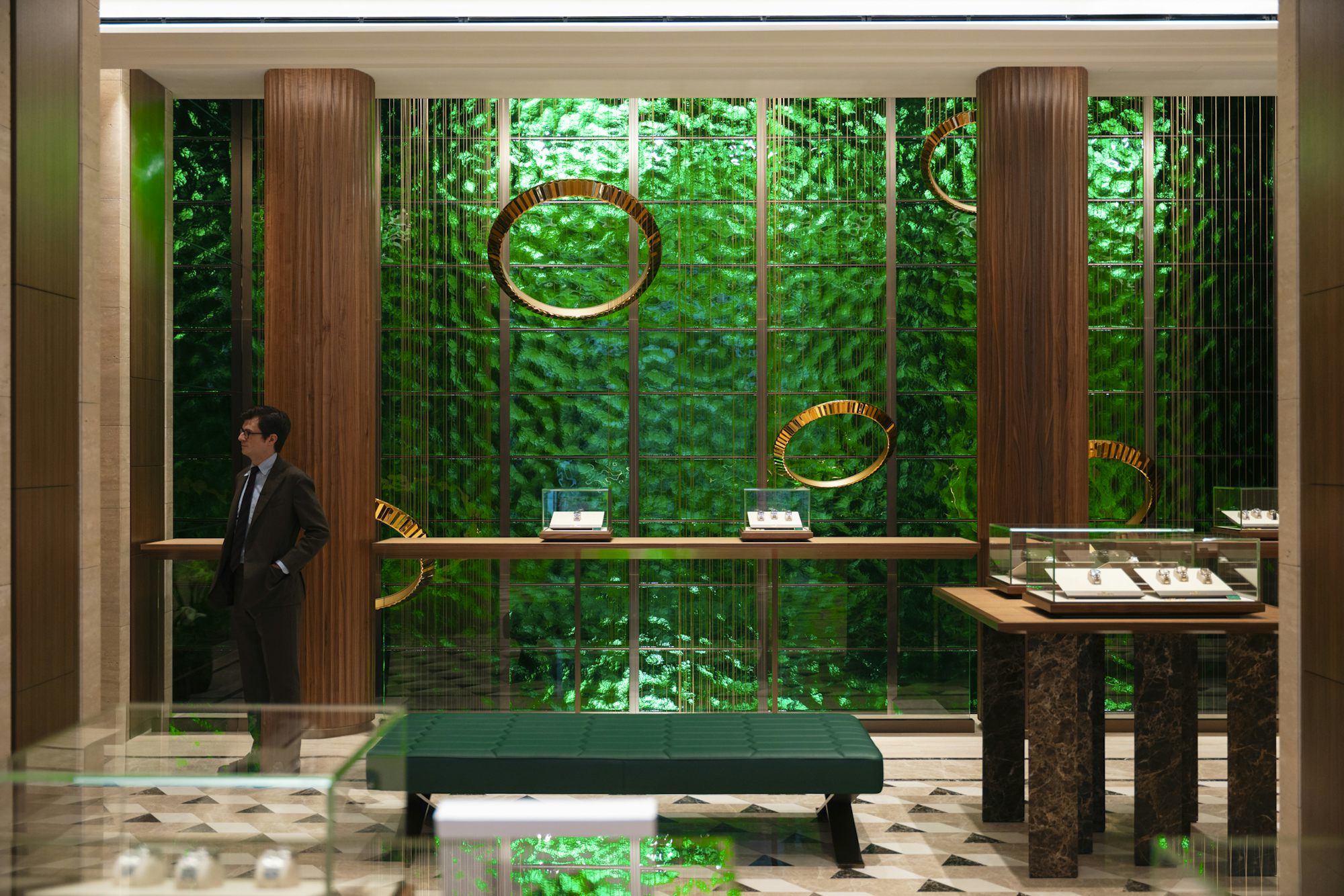 One flight up, the top floor is dedicated entirely to a Rolex Authorized Service Centre, demonstrating Rolex's unwavering commitment to quality. Upon entering, several smaller workstations are visible, along with viewing windows into a workshop where watc