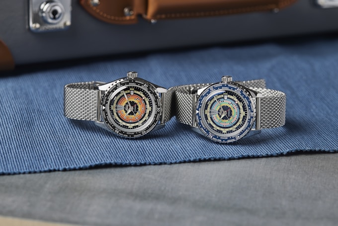 The MIDO Decompression Worldtimer in orange and "rainbow" side by side