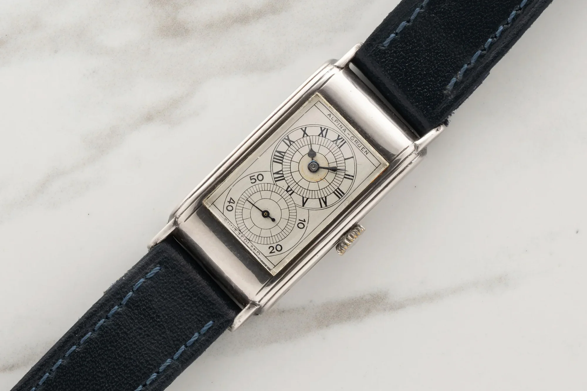 An Alpina-Gruen Techni-Quadron, A Universal Geneve "Eric Clapton" Ref 881101/01, A Cartier "Bebe Guillotine," And More