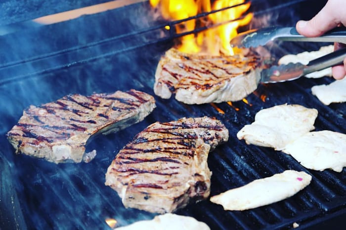 grilling steaks in the summer