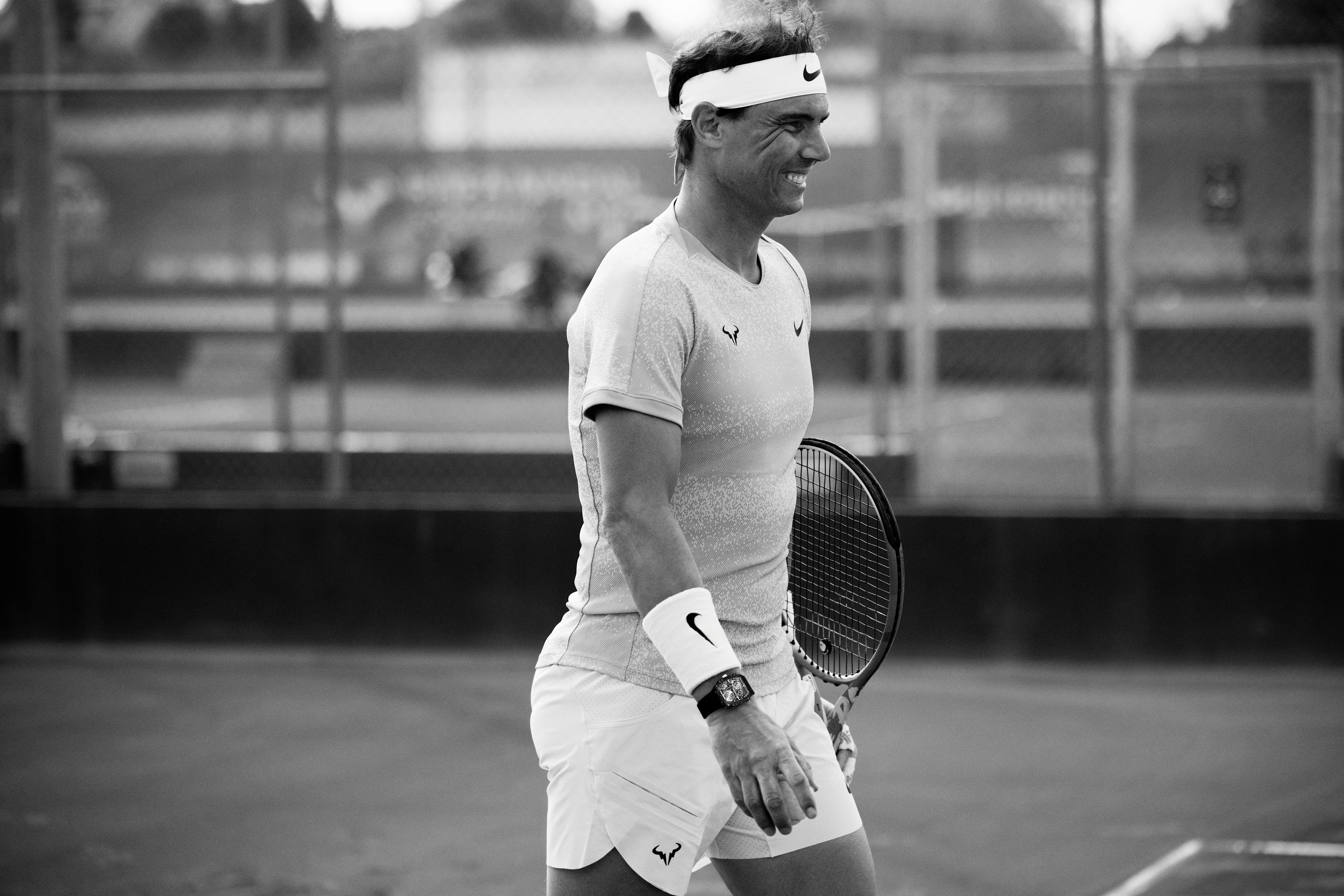 Rafael Nadal playing tennis in an RM 27-05