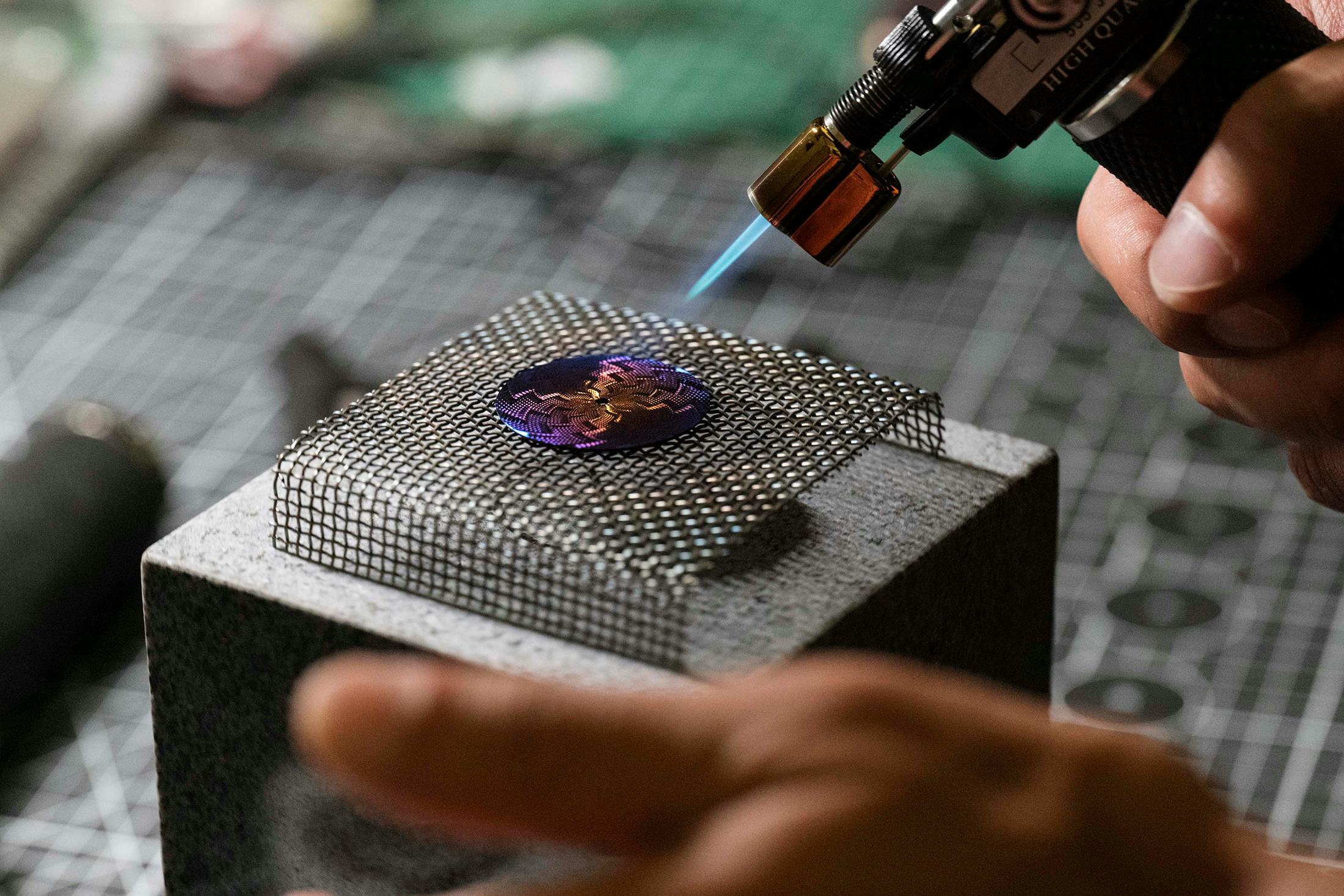 Lightning dial is crafted from grade-2 titanium and individually engine-turned by hand on a traditional rose- engine lathe using a pattern called “Lightning guilloché.”