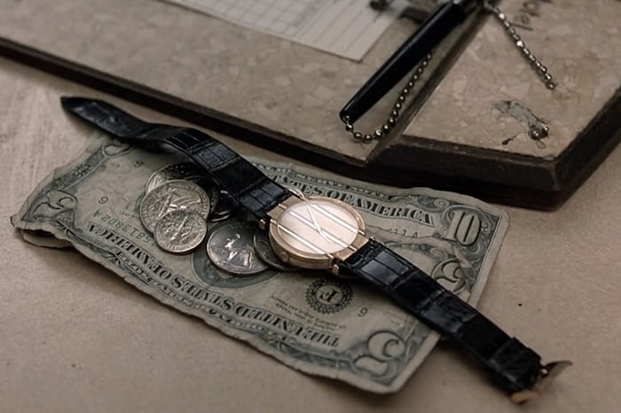 Piaget Polo on a pile of money