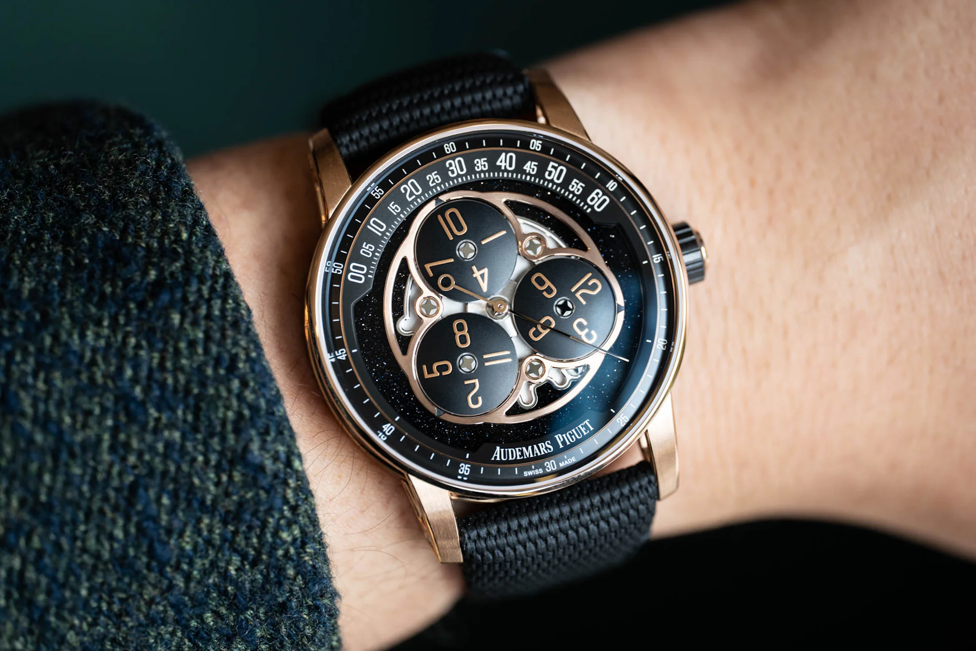 Rose Gold Starwheel wristshot on dark background