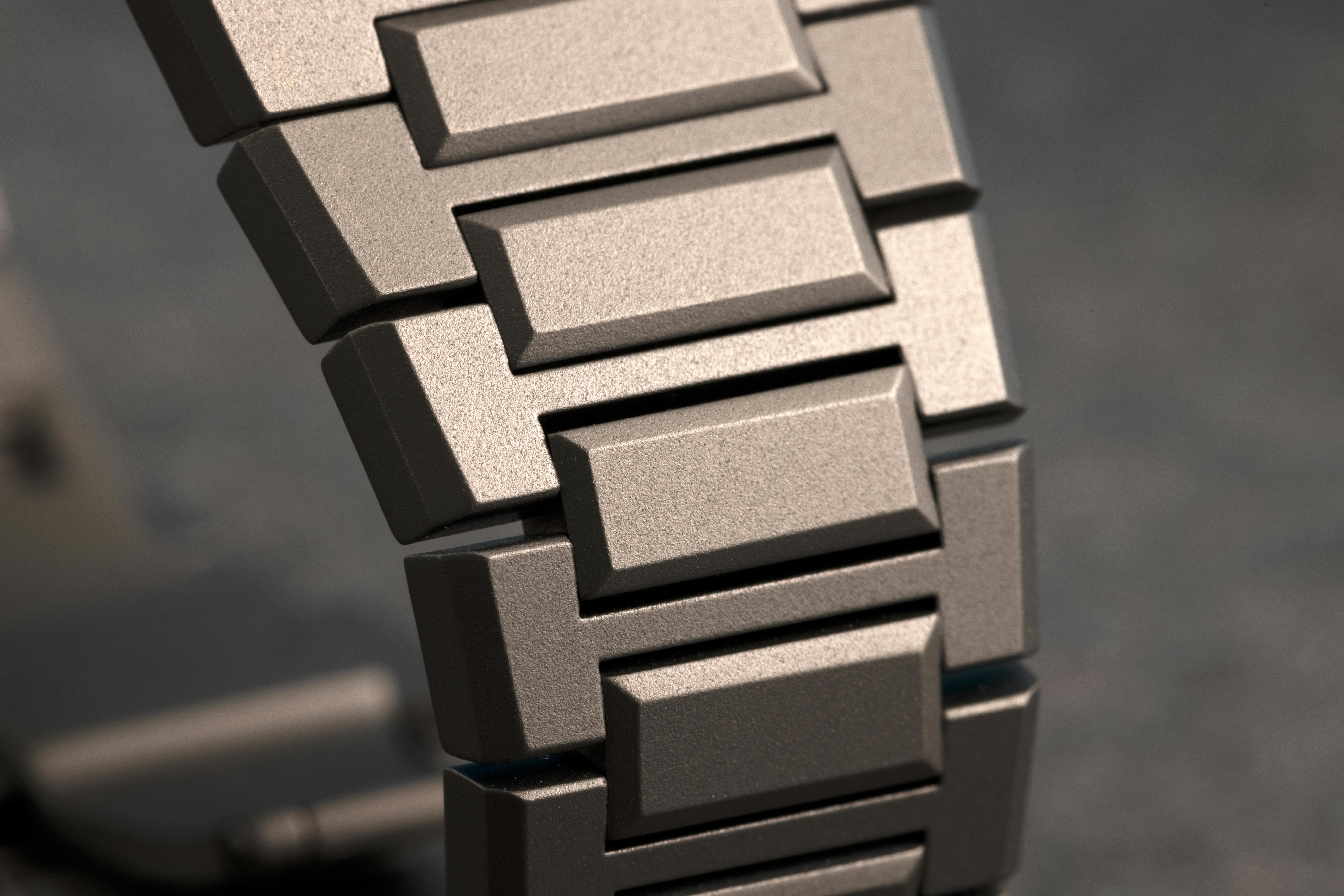 A macro shot of the titanium bracelet on the A close look at the patented Zenith easy adjustment strap-changing system on the Zenith Defy Extreme. 