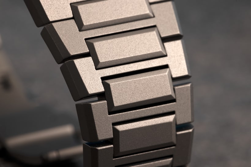 A macro shot of the titanium bracelet on the A close look at the patented Zenith easy adjustment strap-changing system on the Zenith Defy Extreme. 