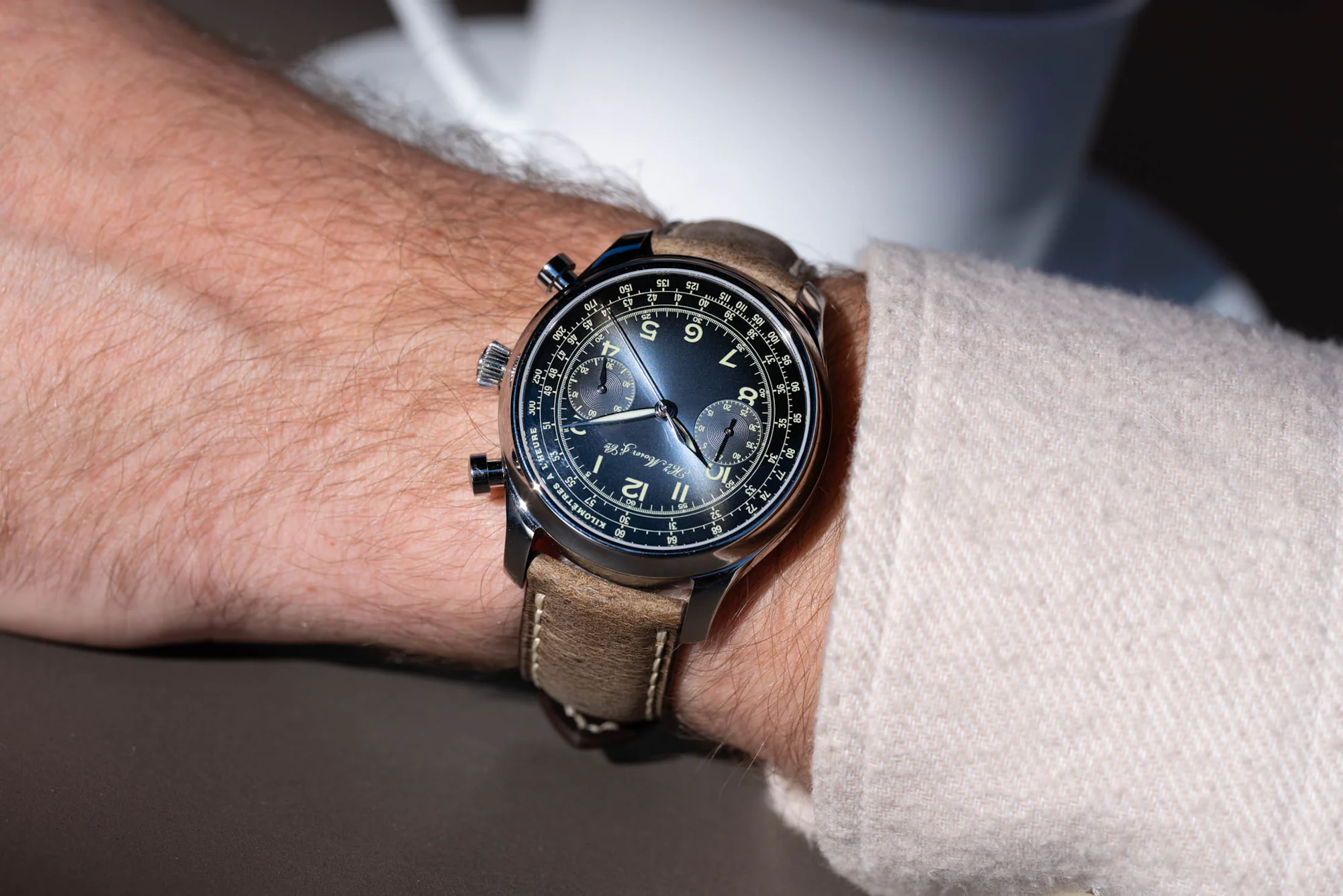 Endeavour Chronograph Wrist Shot with Coffee Cup