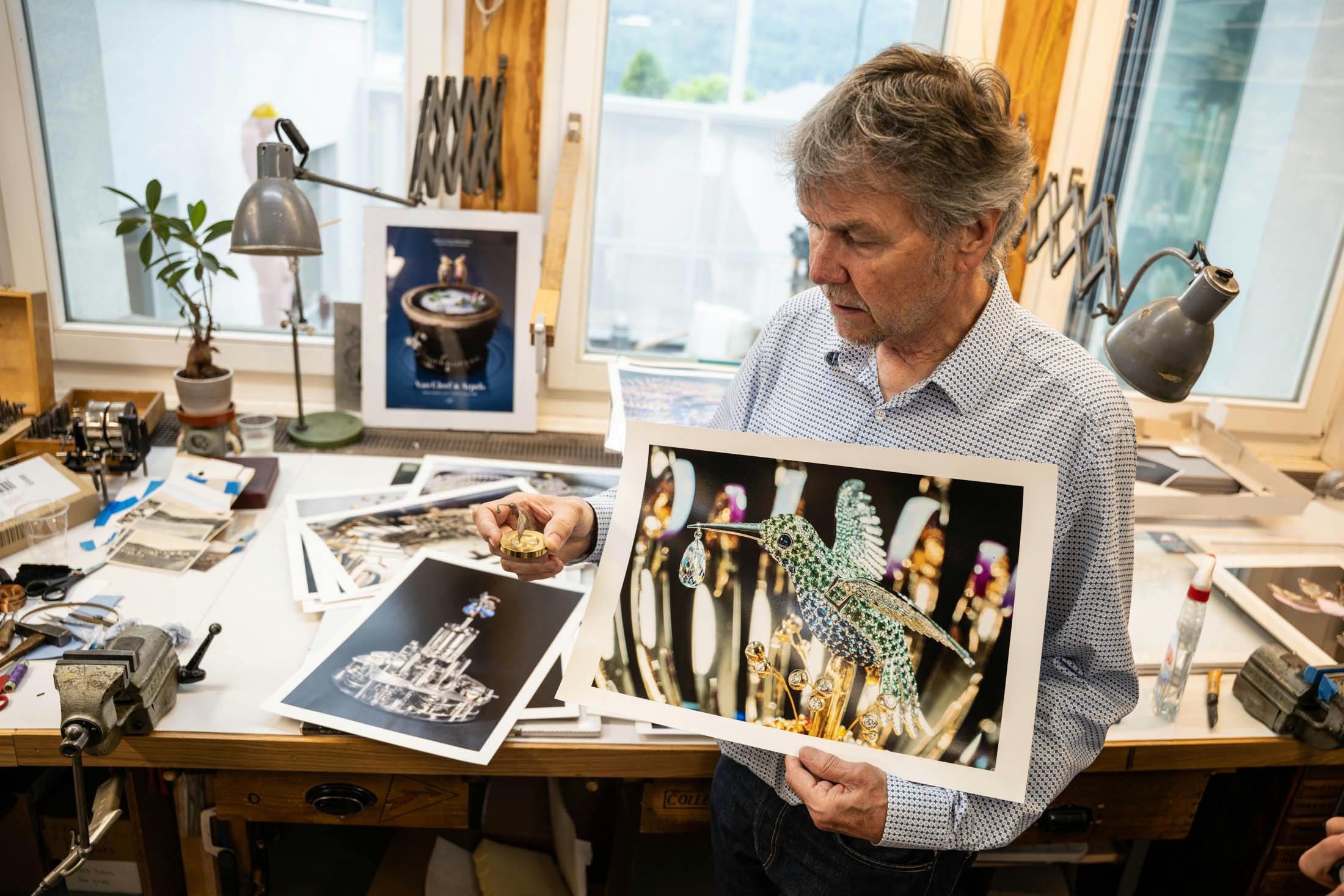 Junod showing off bird automaton miniature