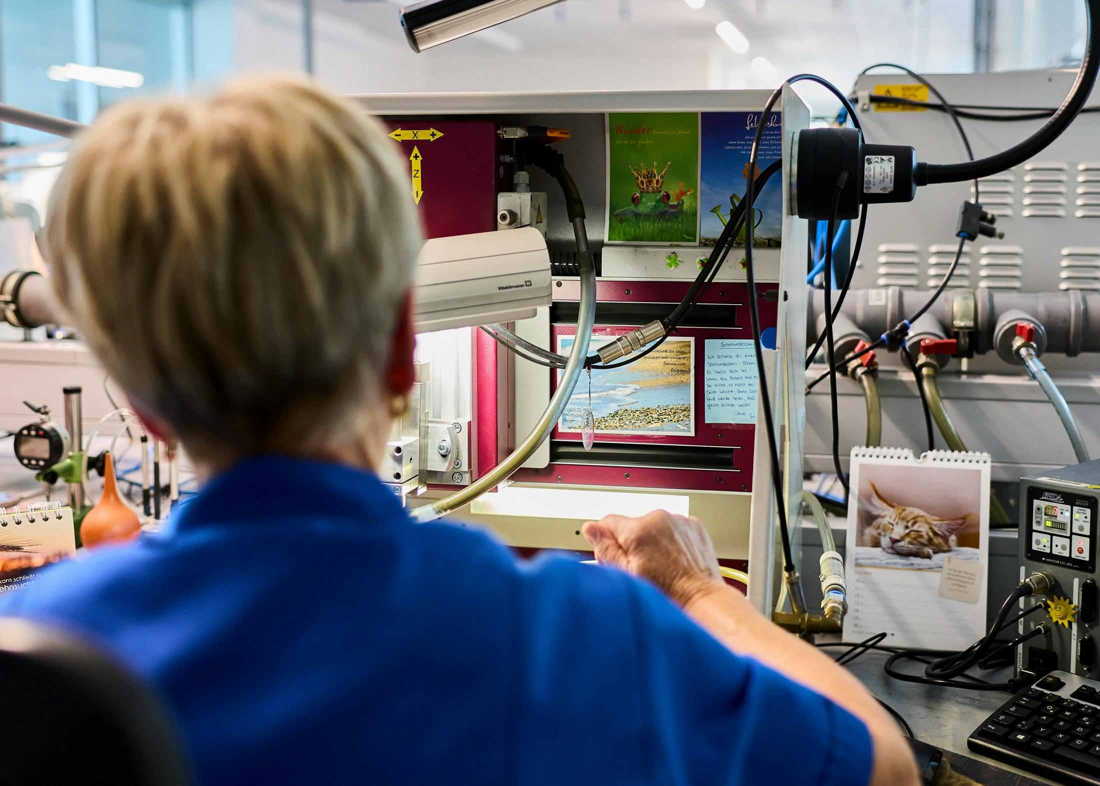 A multi-step process of plating, enameling, stripping, and finishing, results in the signature two toned movement decoration.