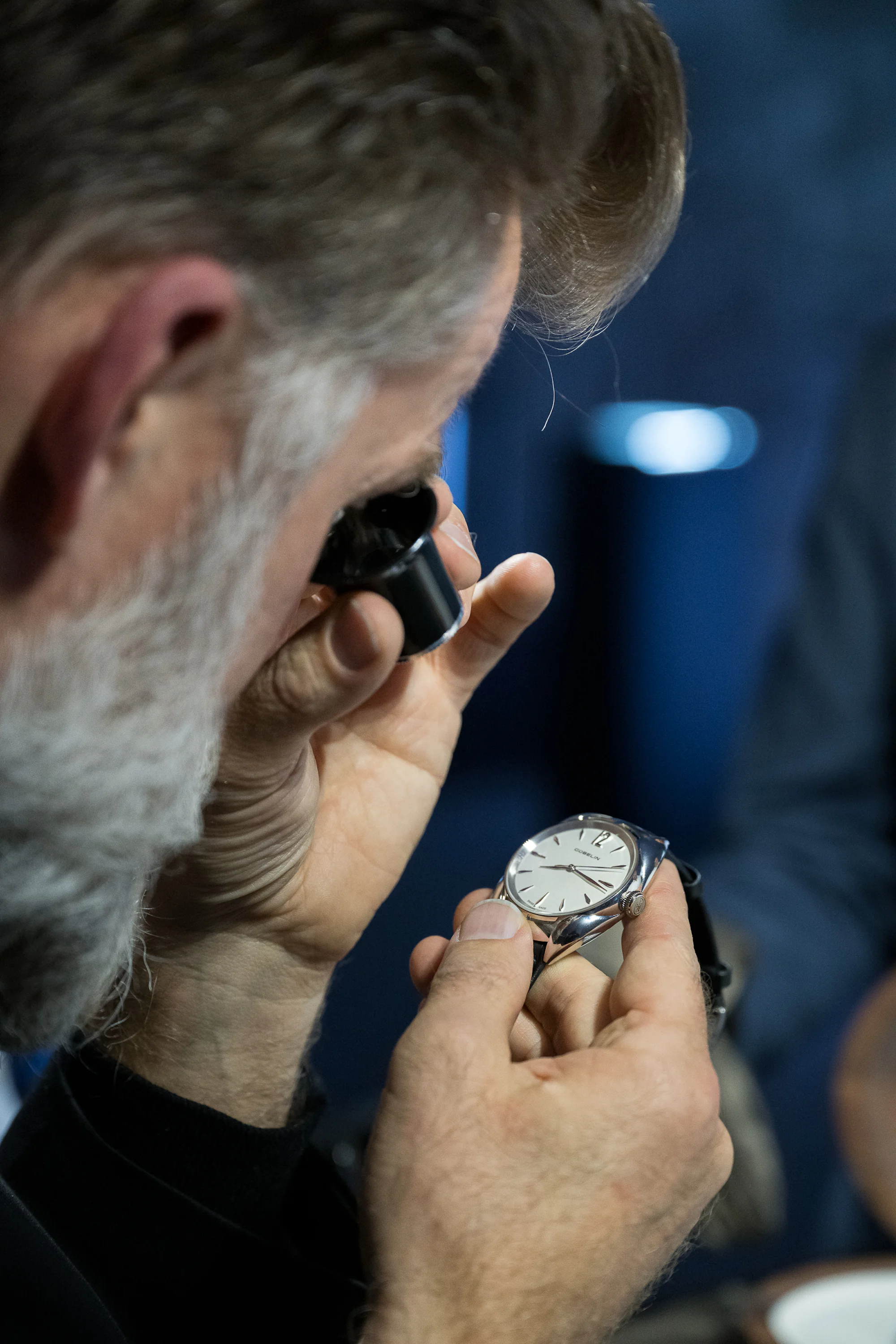 Guest examining the Gübelin watch