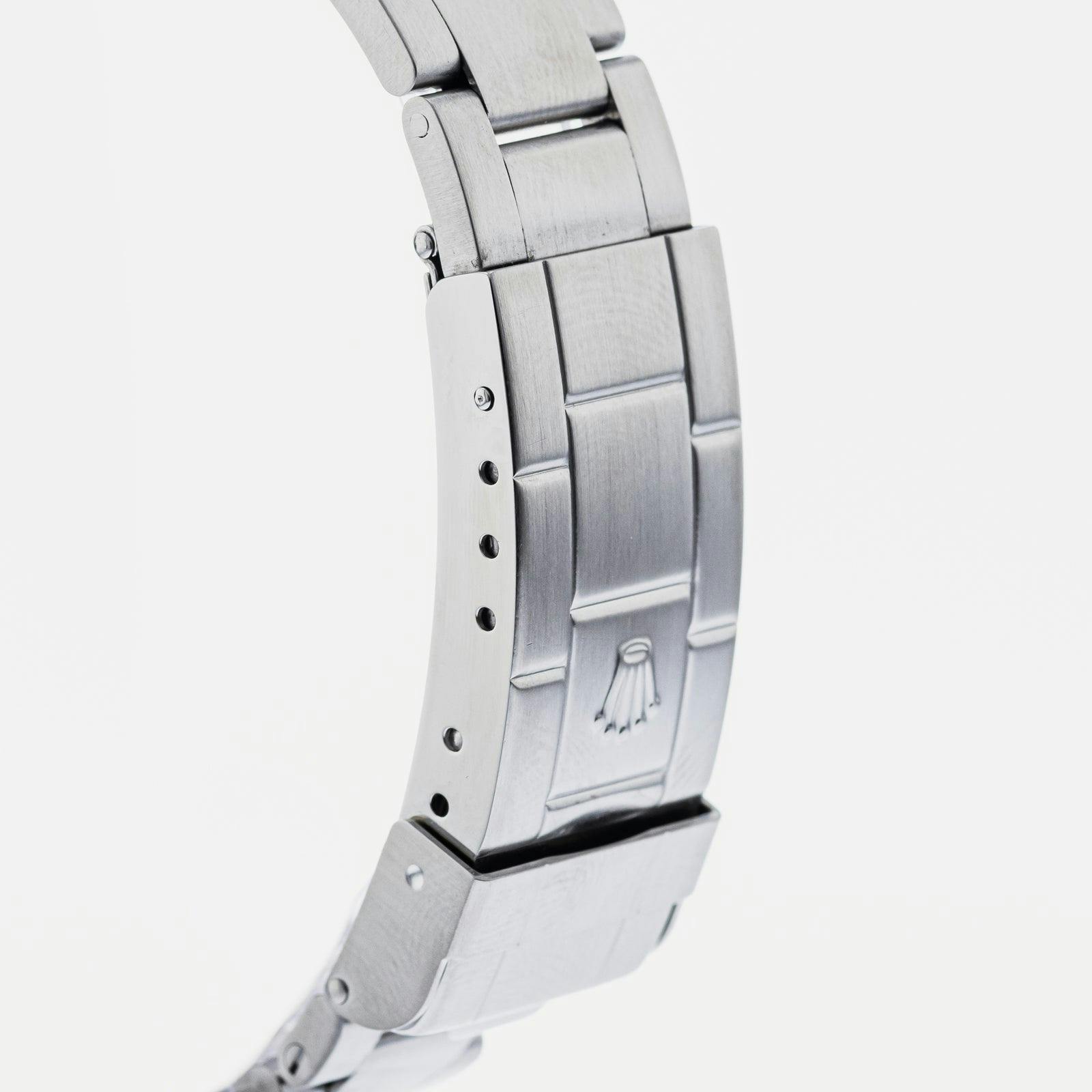 A close look at the bracelet clasp of a Rolex Kermit. 
