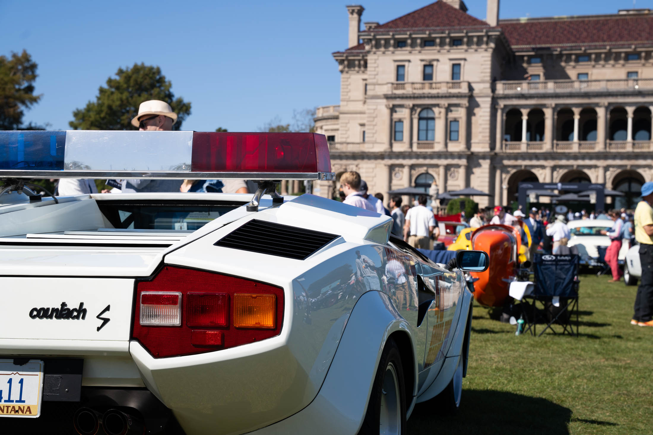 Monza Intervention Car With Breakers Background