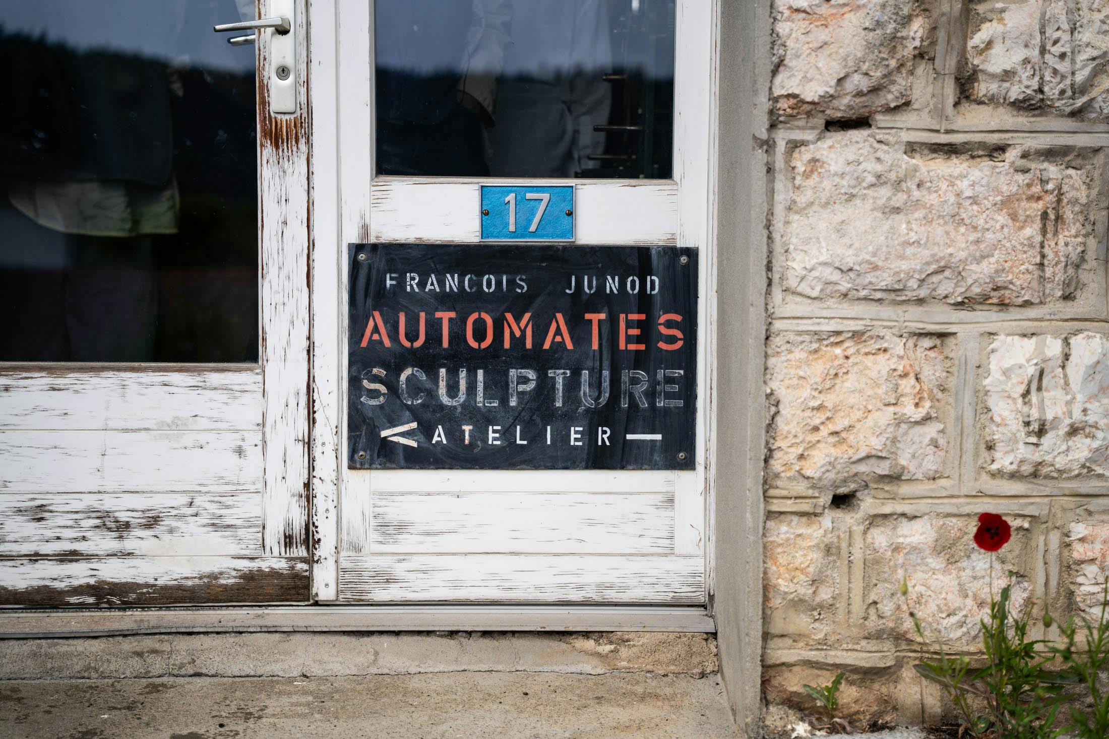 Junod Atelier Sign on door