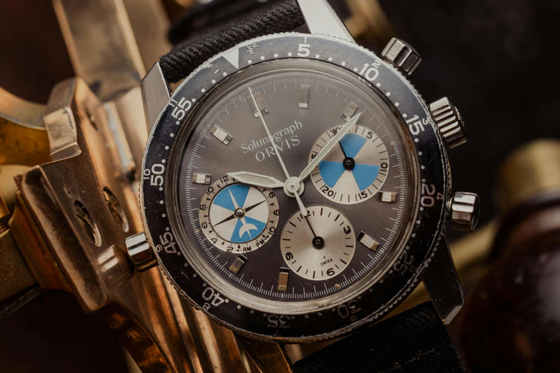 An Orvis Solunagraph, An Omega DeVille Emerald, A Lip Mach 2000 Chronograph, And A Patek Philippe Calatrava