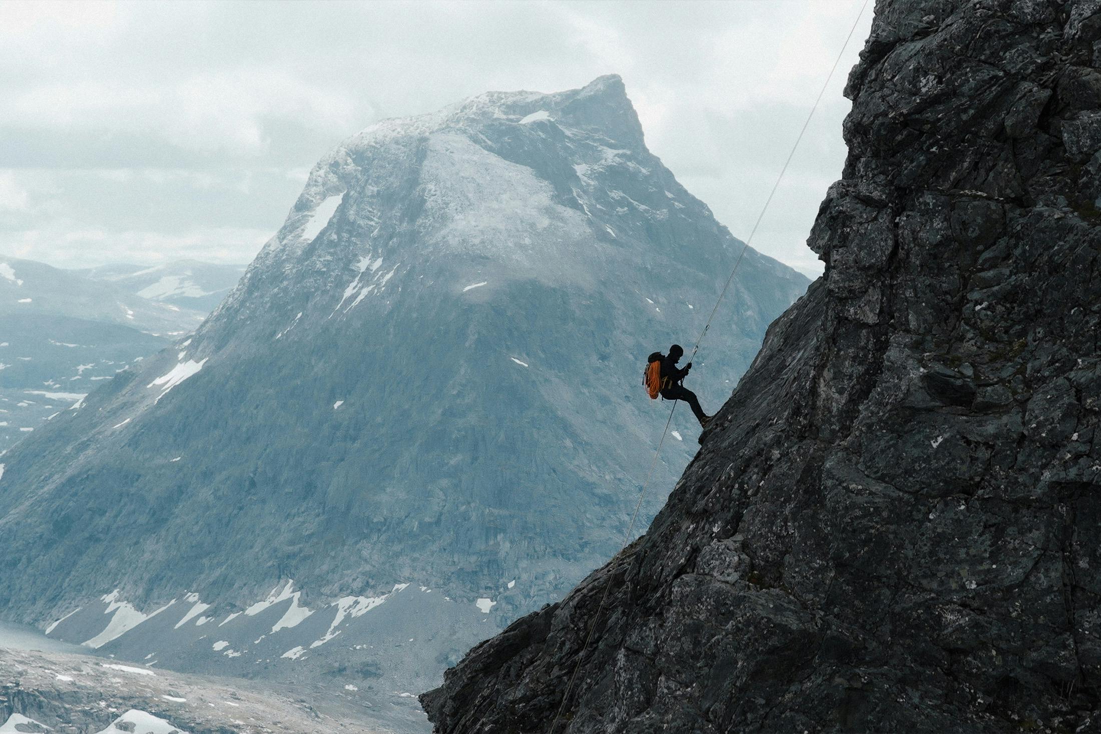 Man on side of mountain
